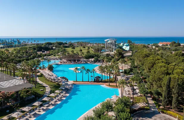 Lara Barut Collection — lagoon pools, palm island and water park beside the sea