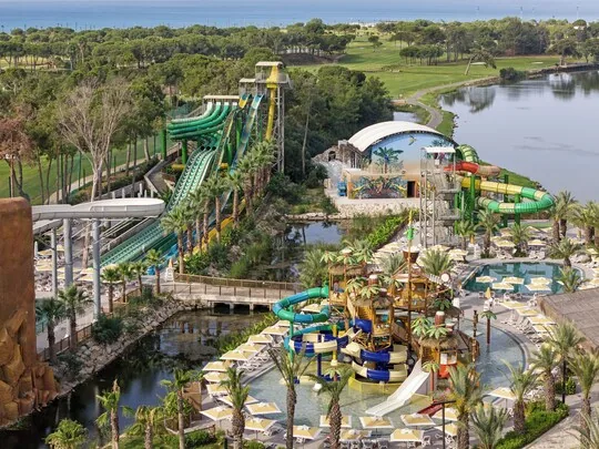 Titanic Deluxe Golf Belek — water park slides and family pools in pine gardens