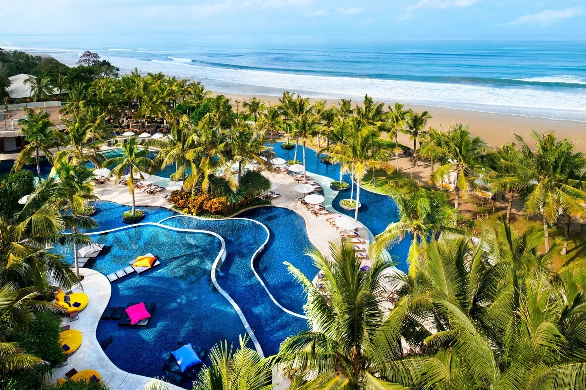 W Bali Seminyak — beachfront pool and Indian Ocean sunset, Bali