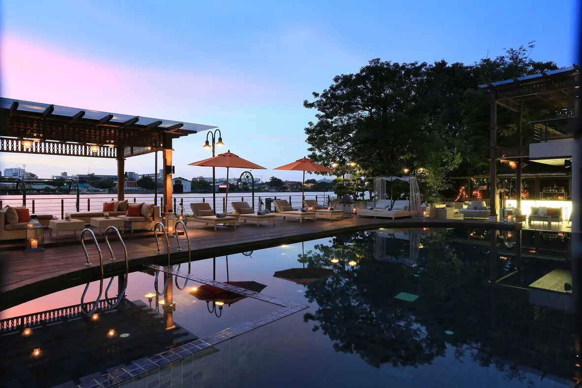 Riva Surya Bangkok — riverside pool near Old City temples