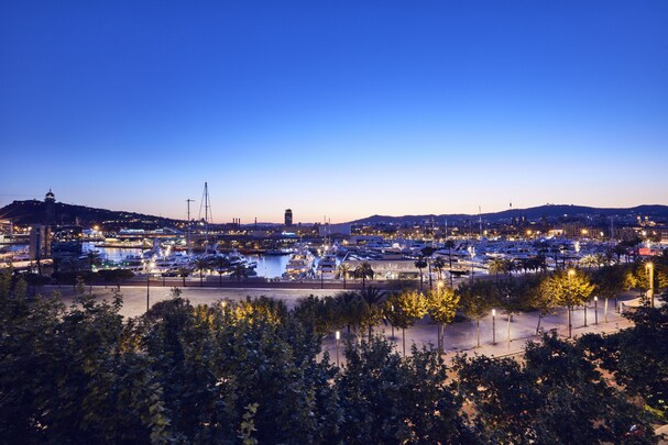 Hotel 54 Barceloneta — Port Vell marina view at twilight, Barcelona