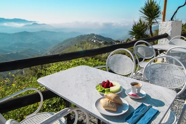 Hotel Rural Los Caracoles — terrace breakfast with mountain views, east coast