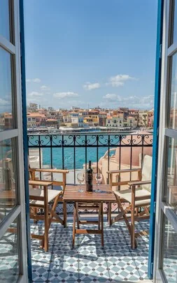 Pandora Suites — balcony view over Chania Venetian harbour