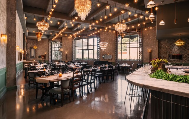 Circa Resort & Casino — upscale dining room with Edison-bulb lighting