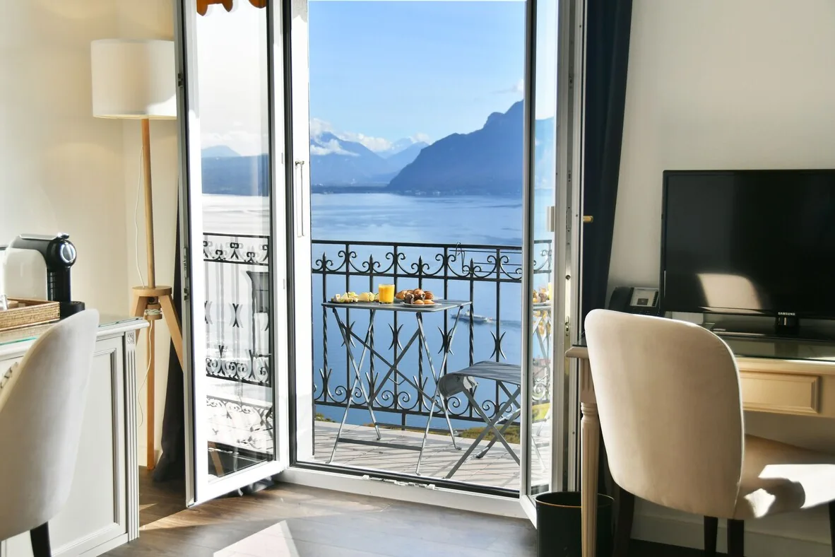 Le Baron Tavernier — terrace above Lavaux vineyards, Lake Geneva