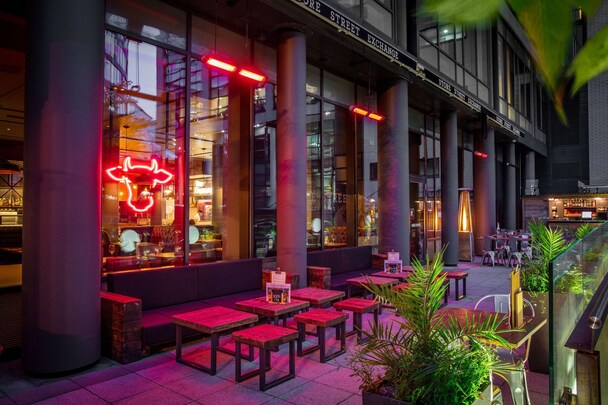 DoubleTree by Hilton Manchester Piccadilly — Store Street Exchange terrace at night