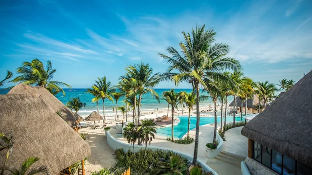 Mahekal Beach Resort — palapa-roofed beachfront bungalows steps from Fifth Avenue, Playa del Carmen