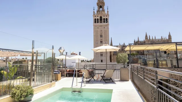 EME Catedral Mercer — rooftop pool facing the Giralda, Seville