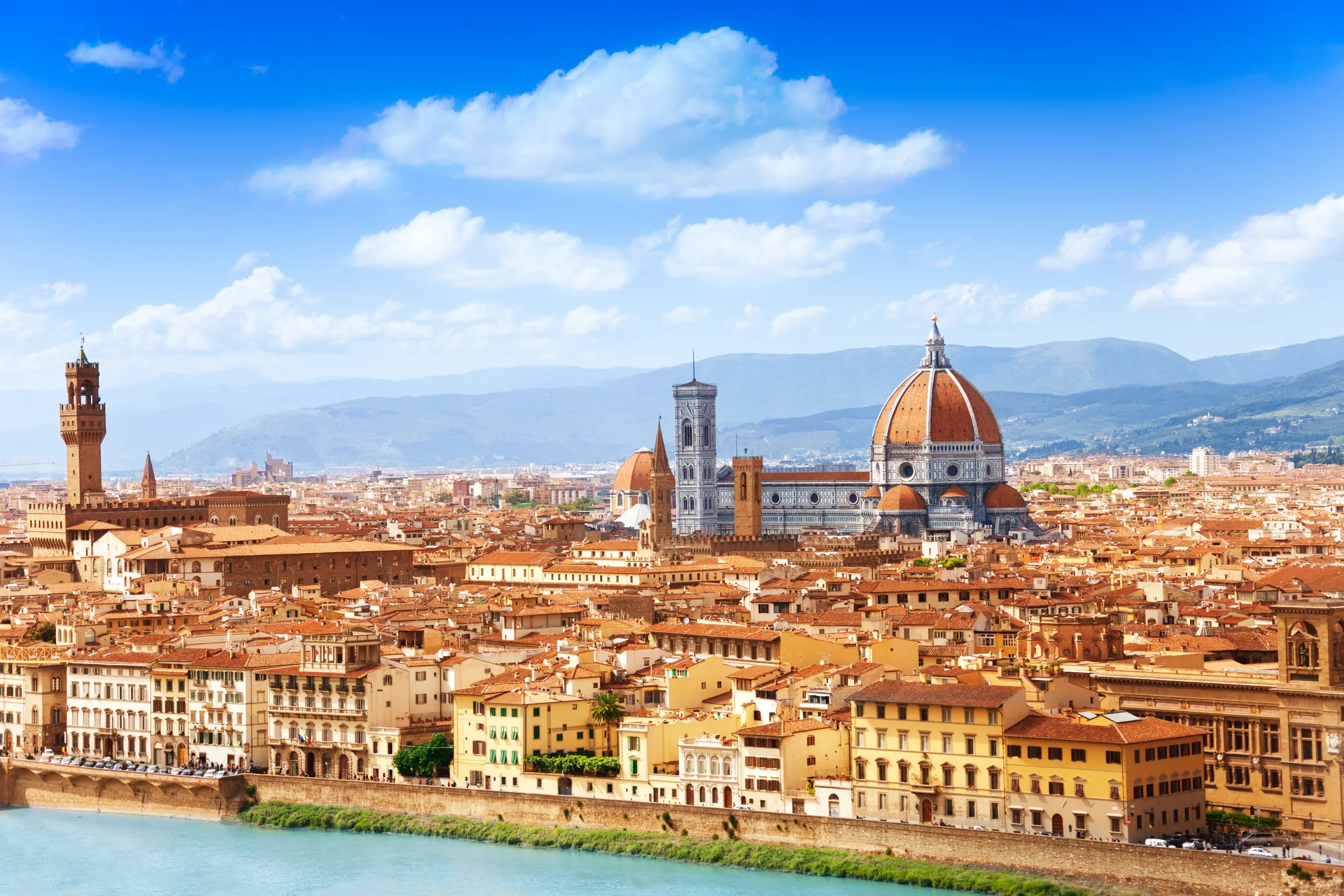 Florence Duomo and terracotta rooftops over the Arno