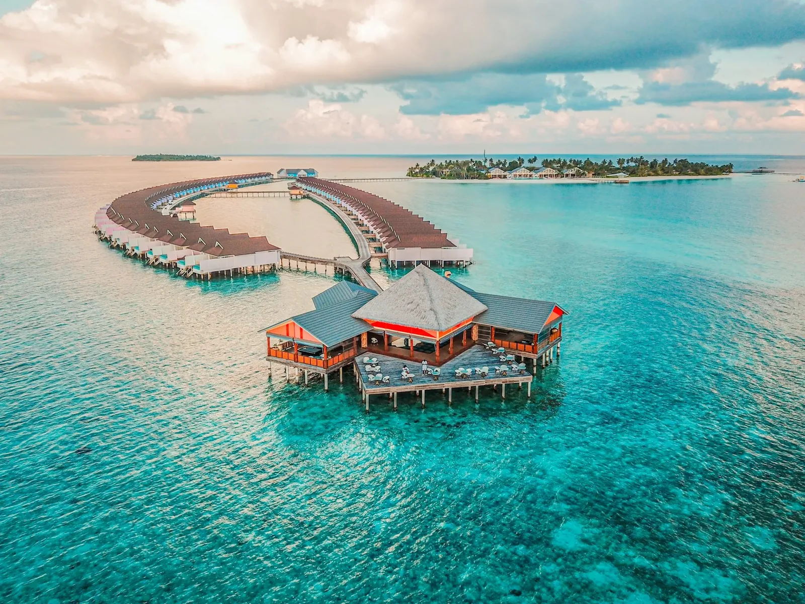 Overwater resort villas at sunrise