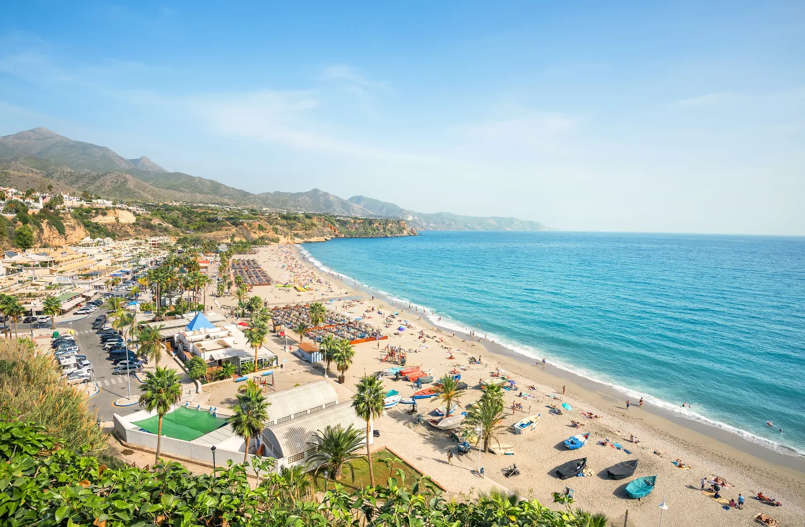 Coastal road in Spain — car rental insurance on fly-drive trips