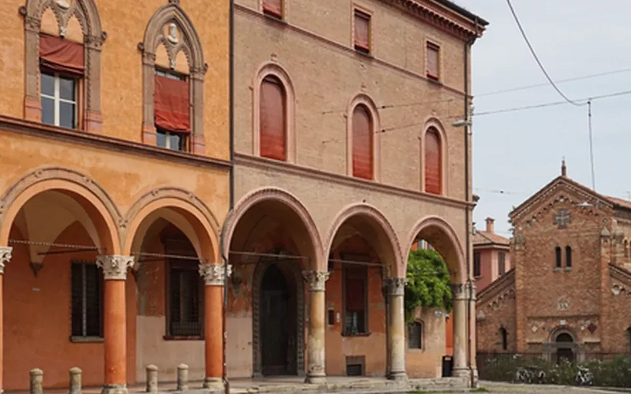 Porticoes and brick church on Piazza Santo Stefano, Bologna