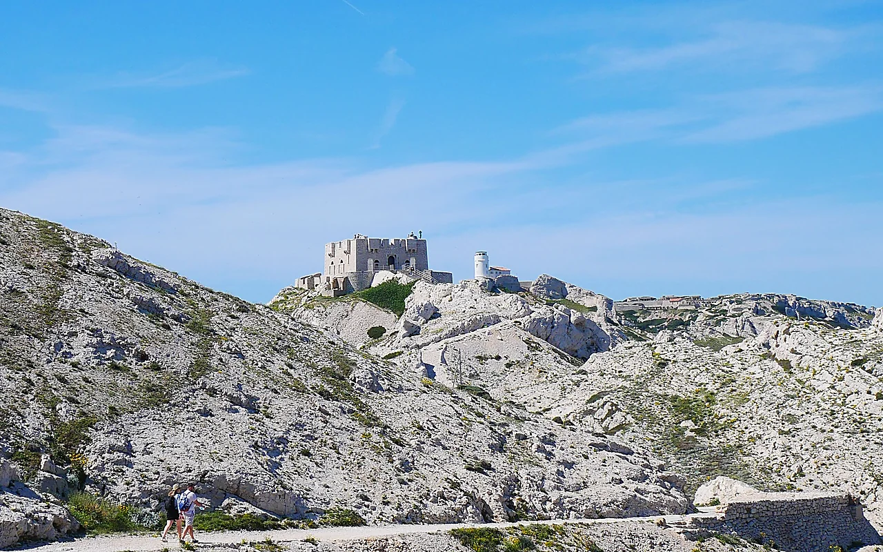 Stone fortress on white limestone rock near Marseille